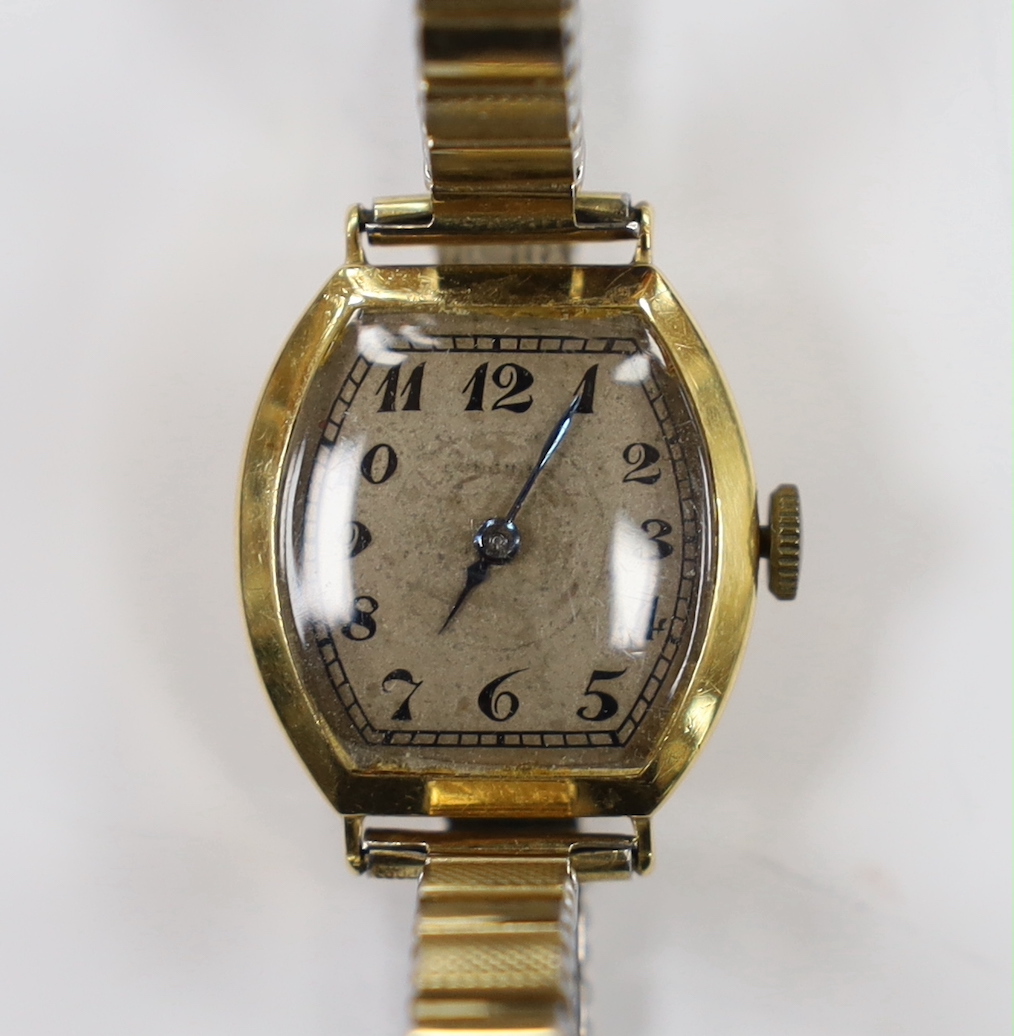 A lady's 1930's 18ct gold Longines manual wind wrist watch, with case back inscription, on a later associated steel and gold plated flexible strap.